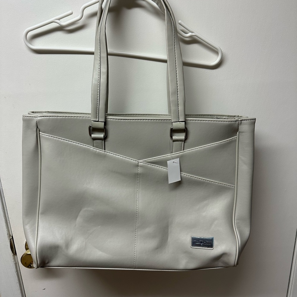 Women’s tote bag, brand new. Light gray color.
